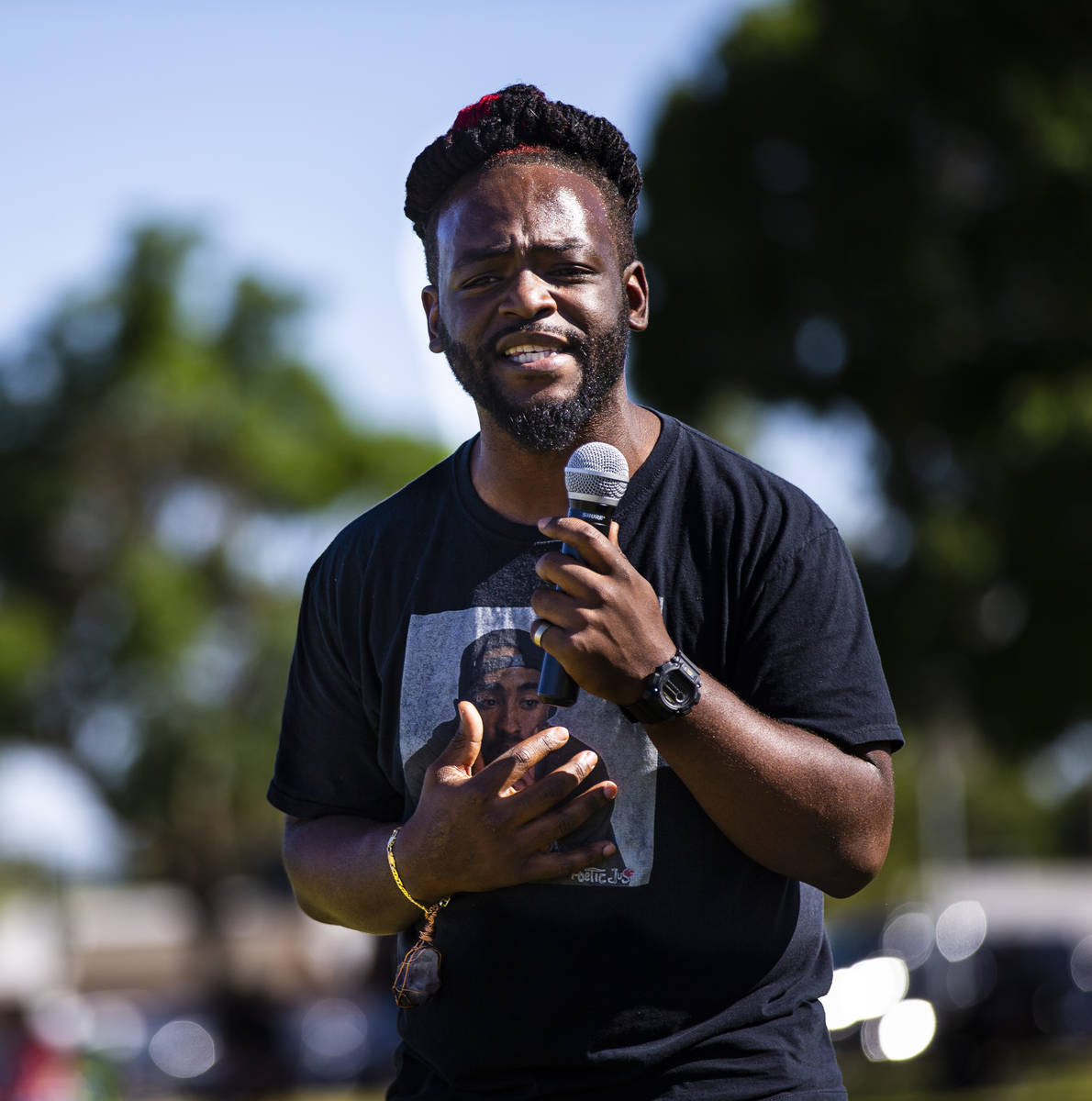 Darelle Davis, who goes by Rell Da Truth, of Las Vegas, performs during a Juneteenth event held ...