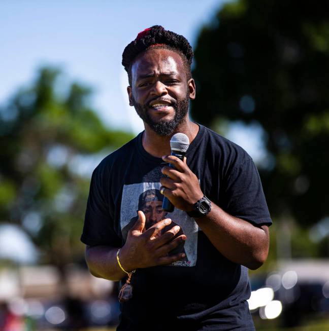 Darelle Davis, who goes by Rell Da Truth, of Las Vegas, performs during a Juneteenth event held ...