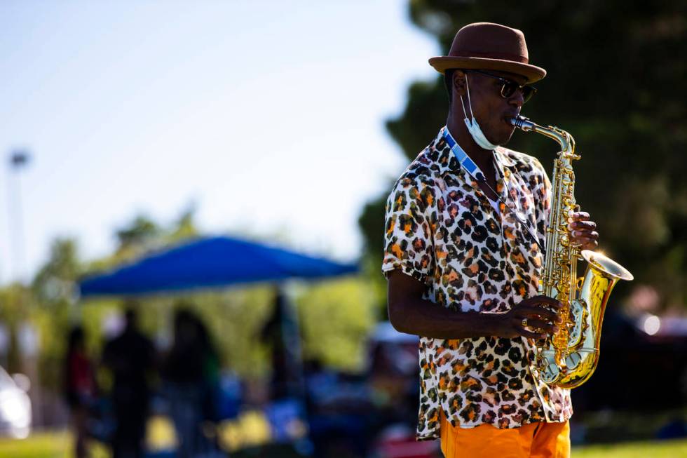 Jimi Duck performs during a Juneteenth event held by Save Our Sons at Lorenzi Park in Las Vegas ...