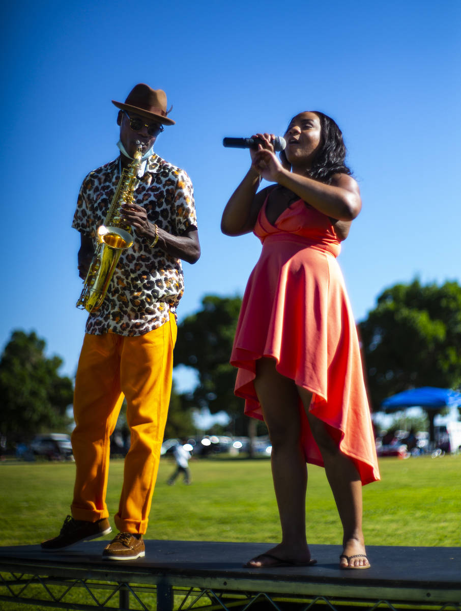 Jimi Duck, left, and Brittany Soul, of Las Vegas, perform during a Juneteenth event held by Sav ...