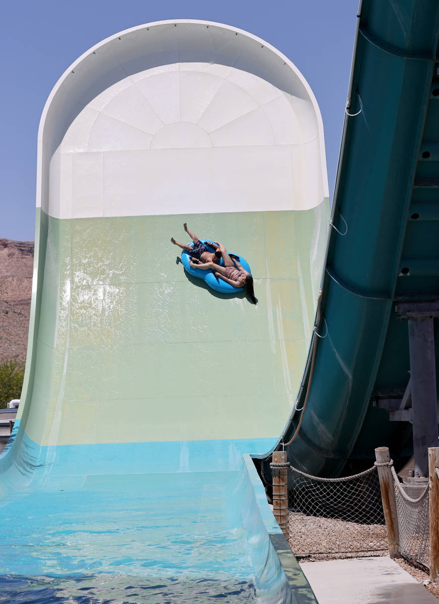 Jerimiah Rivera, 12, and his cousin Maggie Brill, 16, of Las Vegas ride the Hoover Half Pipe on ...