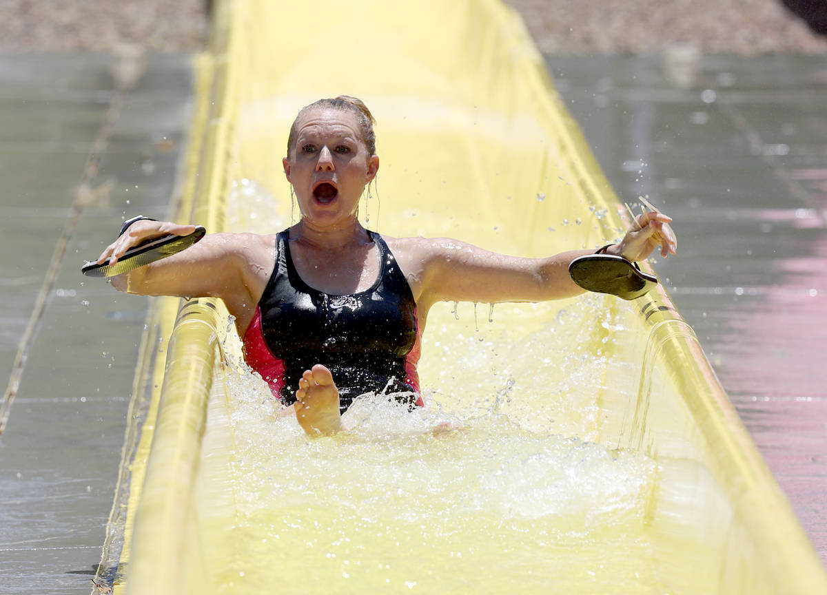 Jenny Losee of Henderson finishes her ride on Canyon Cliffs on opening day at Wet 'n' Wild wate ...