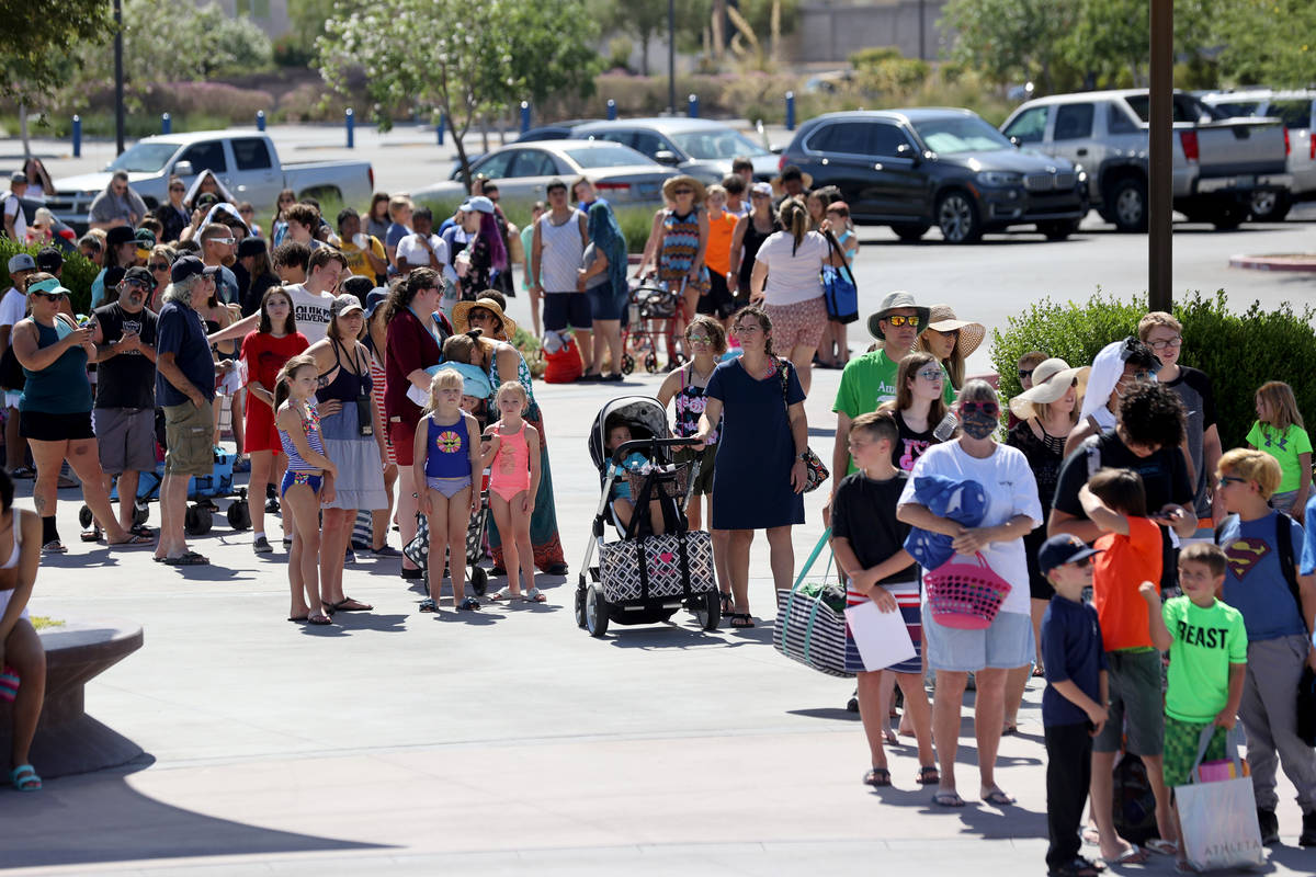 People line up on opening day of Wet 'n' Wild water park in Las Vegas Monday, June 22, 2020. (K ...