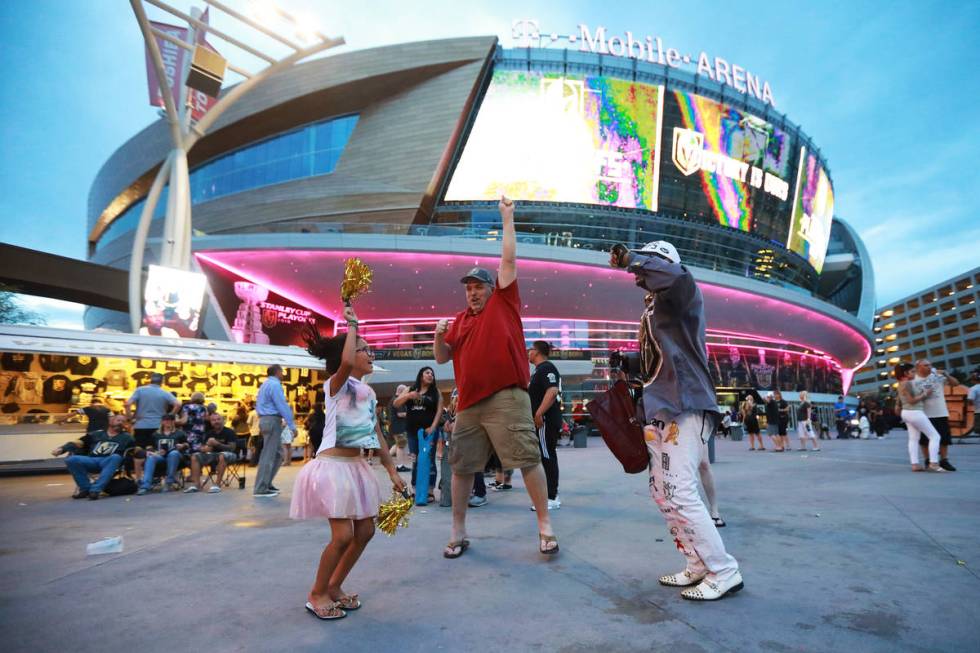 Fans celebrate after the Vegas Golden Knights defeated the San Jose Sharks during a watch party ...