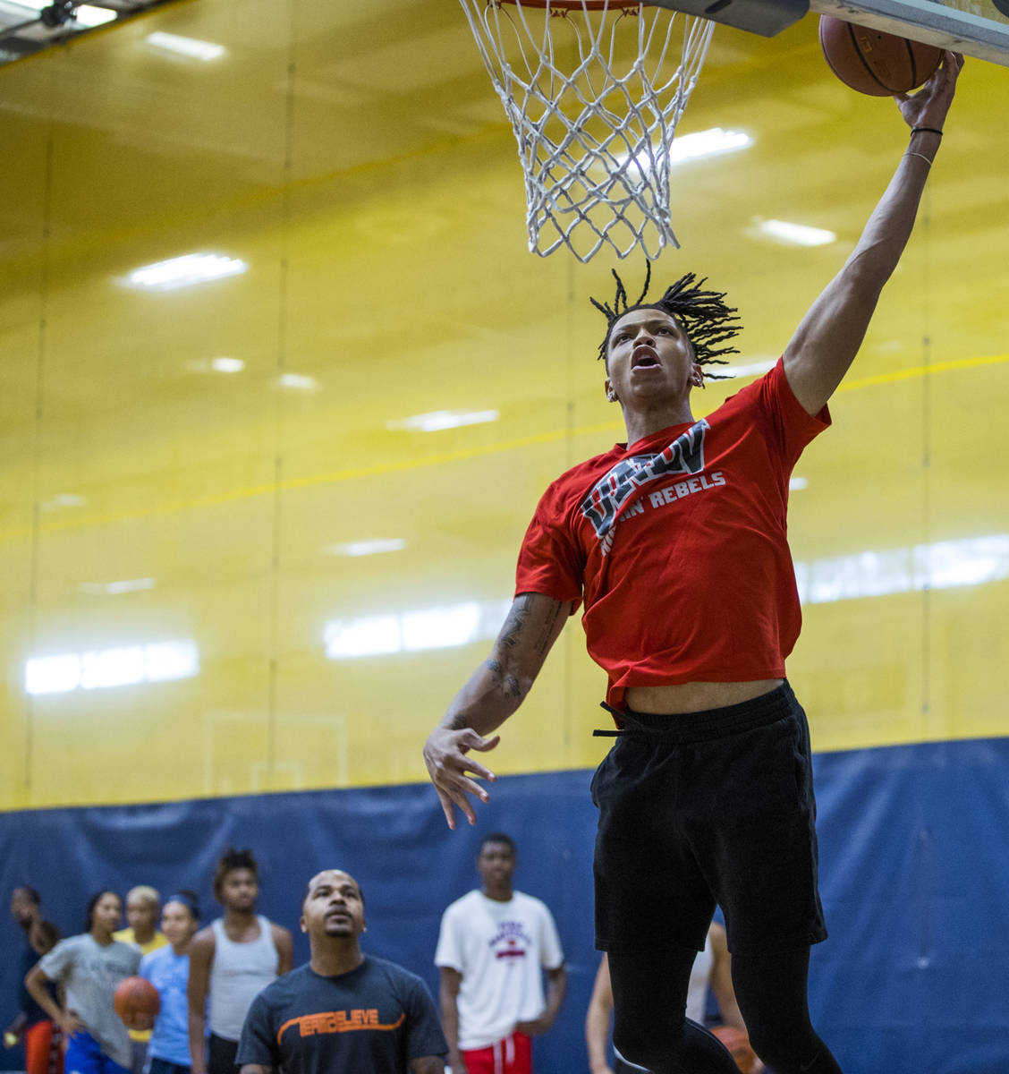 UNLV freshman wing Nick Blake lays in a shot on the court at the Tarkanian Basketball Academy o ...