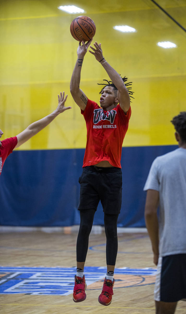 UNLV freshman wing Nick Blake gets off a shot on the court at the Tarkanian Basketball Academy ...