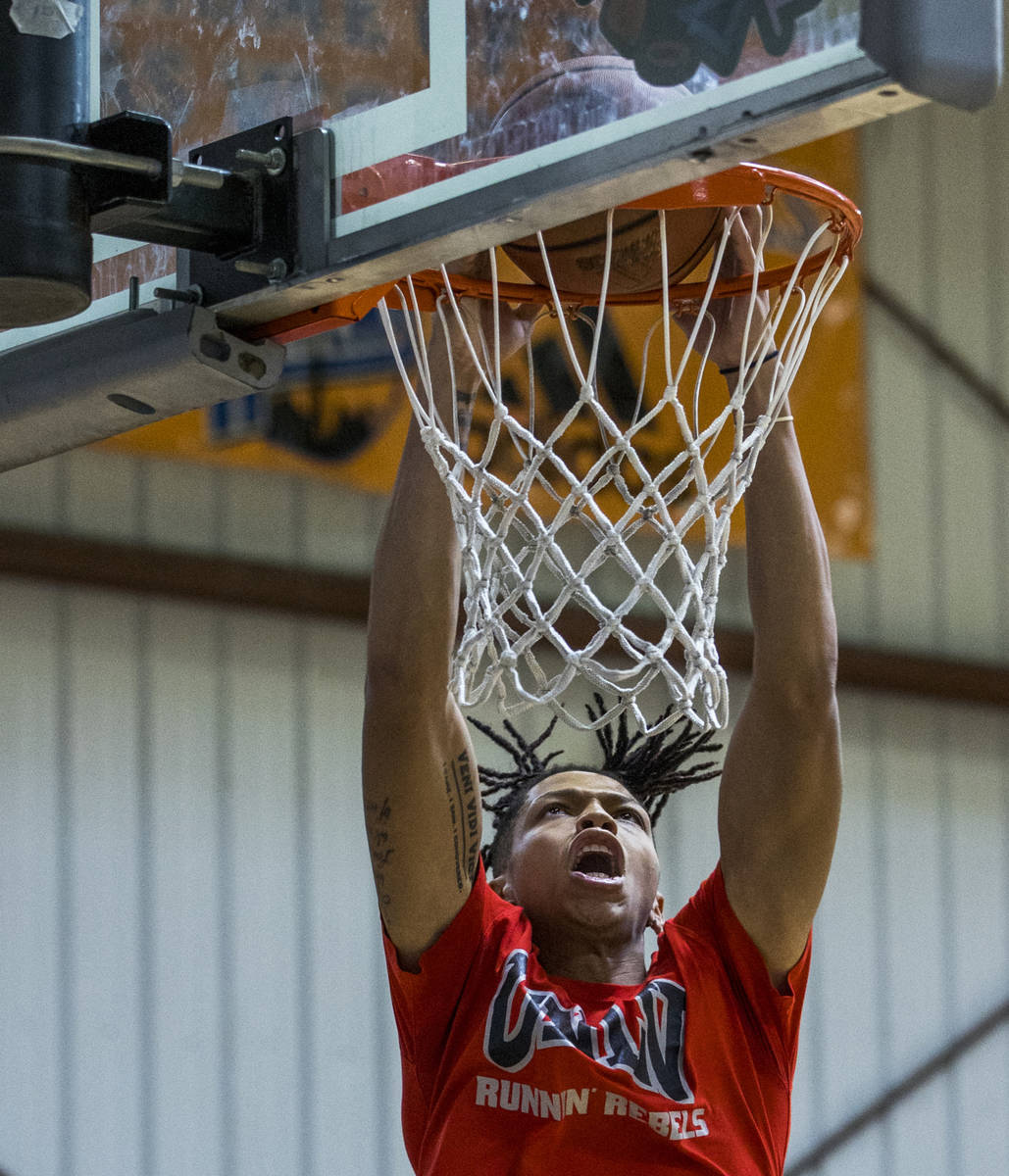 UNLV freshman wing Nick Blake dunks the ball on the court at the Tarkanian Basketball Academy o ...