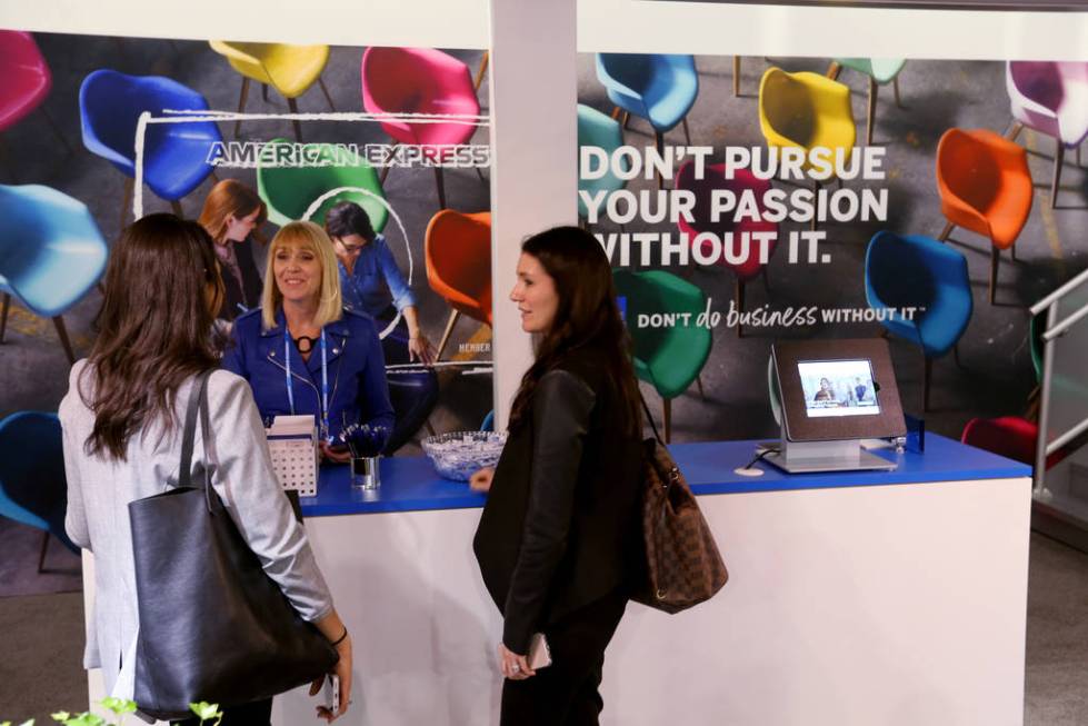 Robin Rotz of Phoenix, center, visits with Liz Kohansedgh, left, and Emily Chin, both of New Yo ...