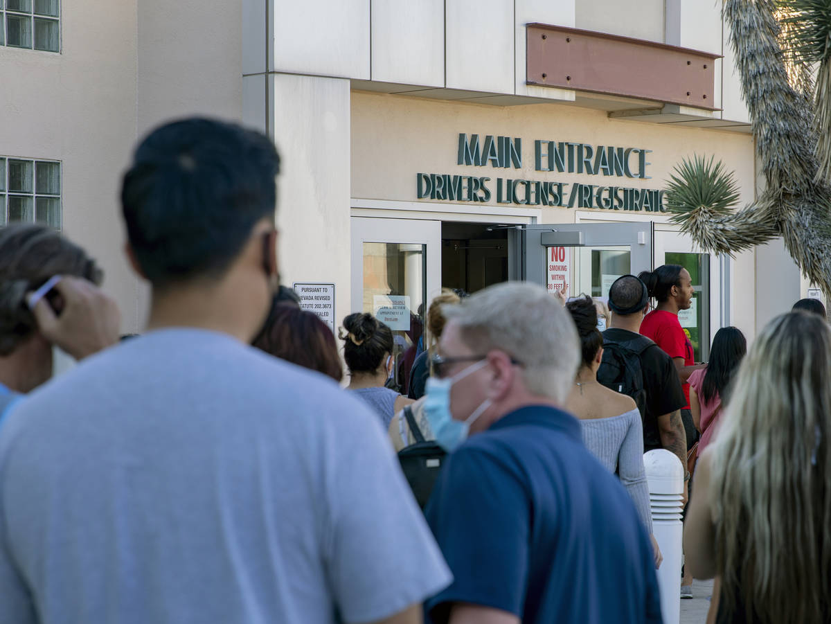 People wait in line at the Nevada Department of Motor Vehicles at 8250 West Flamingo Road, Las ...