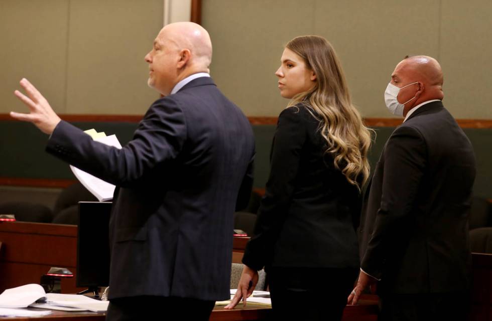 Defense attorneys Tony Sgro, left, Colleen Savage, center, defendant Lawrence Rinetti Jr., a f ...