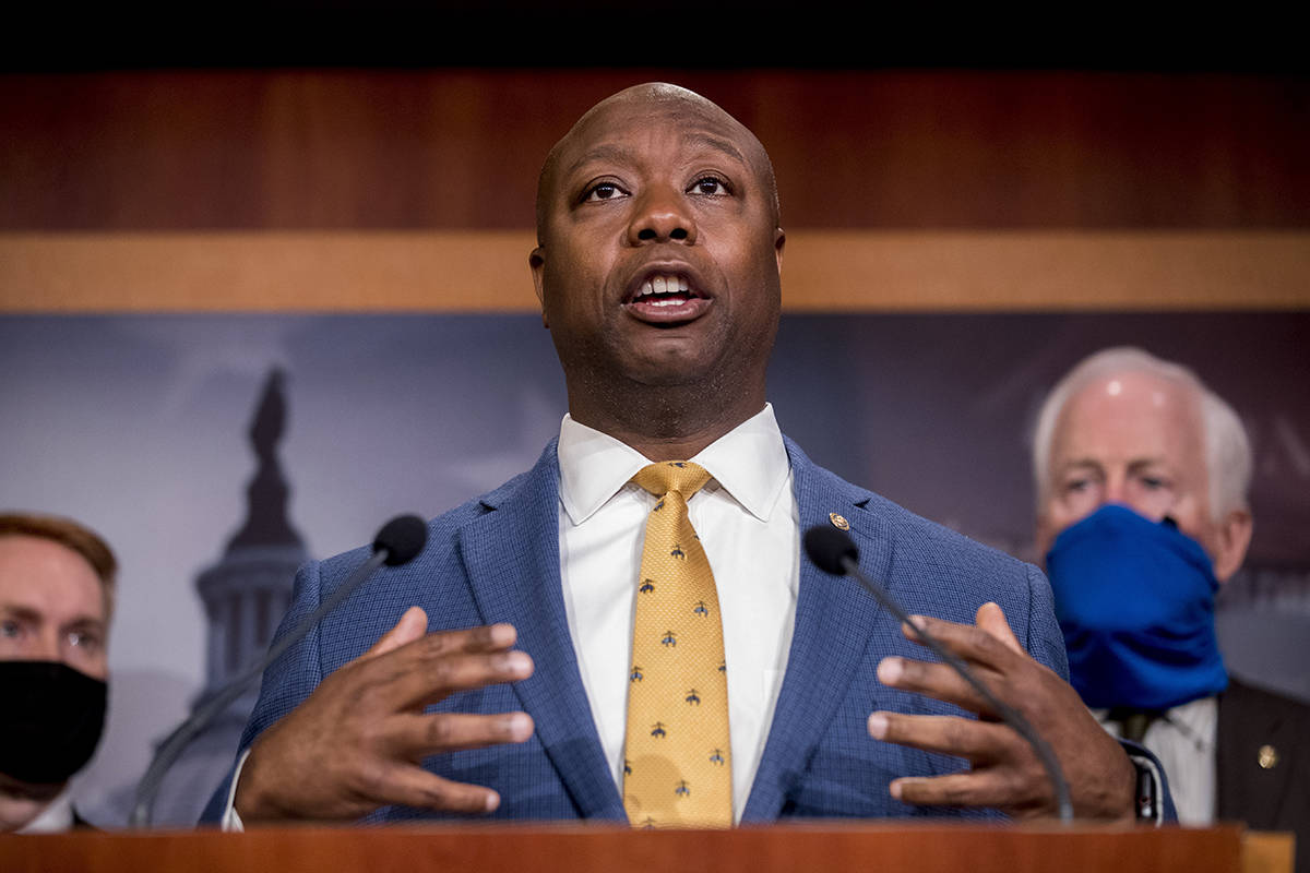 FILE - In this June 17, 2020, file photo, Sen. Tim Scott, R-S.C., accompanied by Republican sen ...