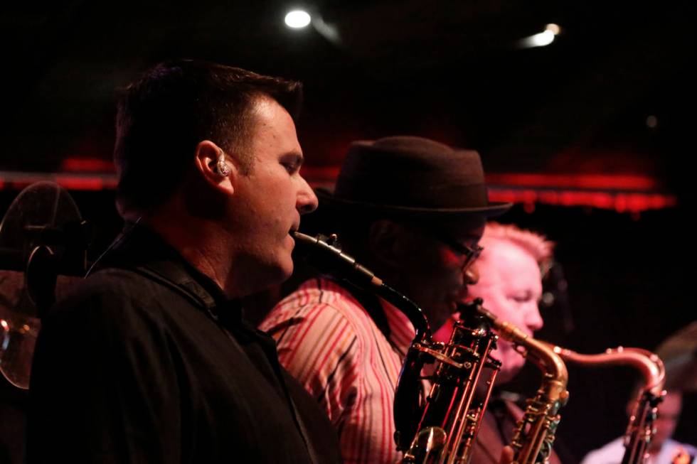 Eric Tewalt, member of the Santa Fe & The Fat City Horns, performs at the Copa Room in Las ...