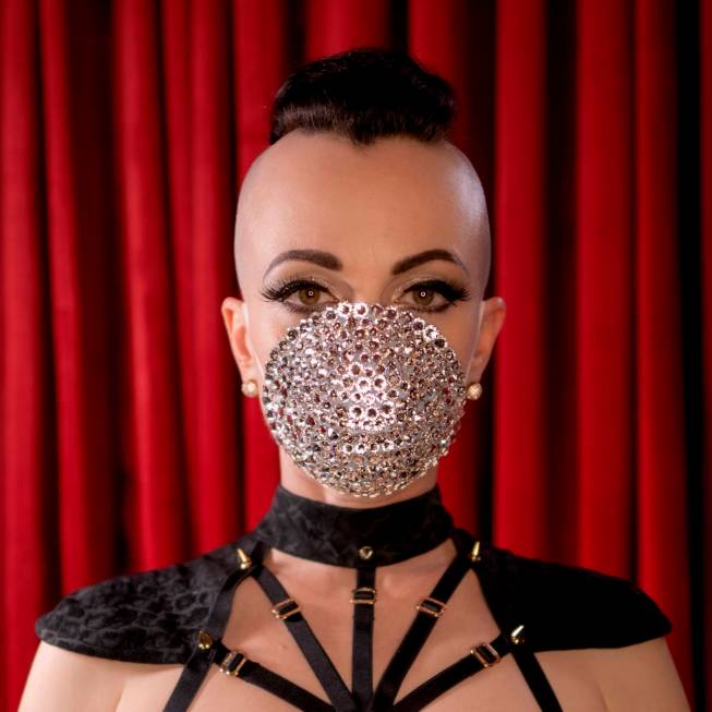 Michelle L'Amour, creator of "Quarantine Cabaret," is shown with her customized pandemic mask. ...