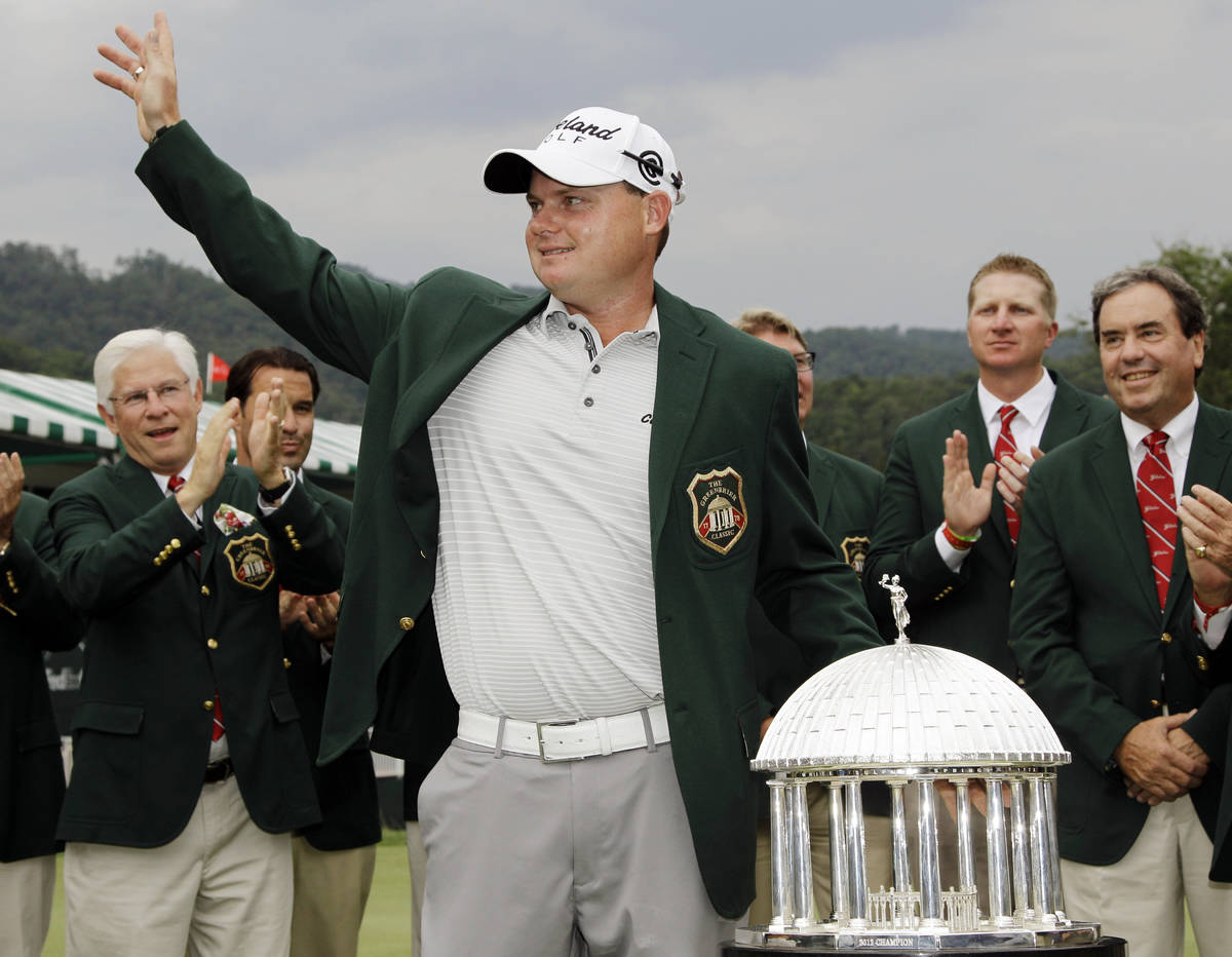 Ted Potter Jr. waves to the crowd as he celebrates winning the Greenbrier Classic PGA Golf tour ...