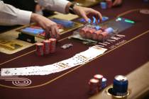 Poker chips are collected at Sahara Las Vegas casino-hotel in Las Vegas in February 2020. (Erik ...
