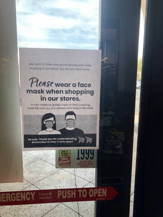 A sign posted at Albertsons at W. Charleston Blvd. and Desert Foothills Dr. reminded shoppers t ...
