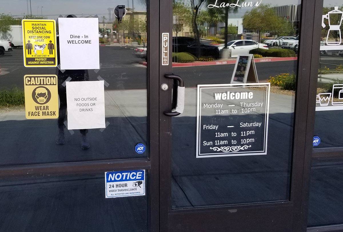 A sign warns patrons not to enter a store at Southwest Marketplace, off Rainbow Boulevard betwe ...