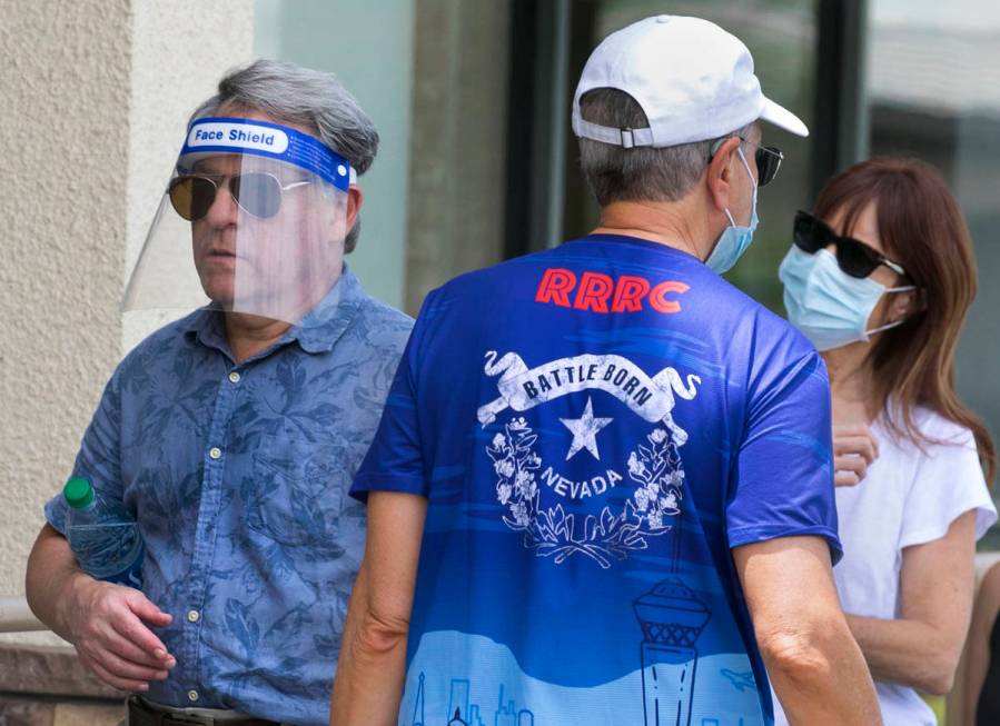 Customers line up to enter Trader Joe's on Friday, June 26, 2020, in Henderson. Starting Friday ...