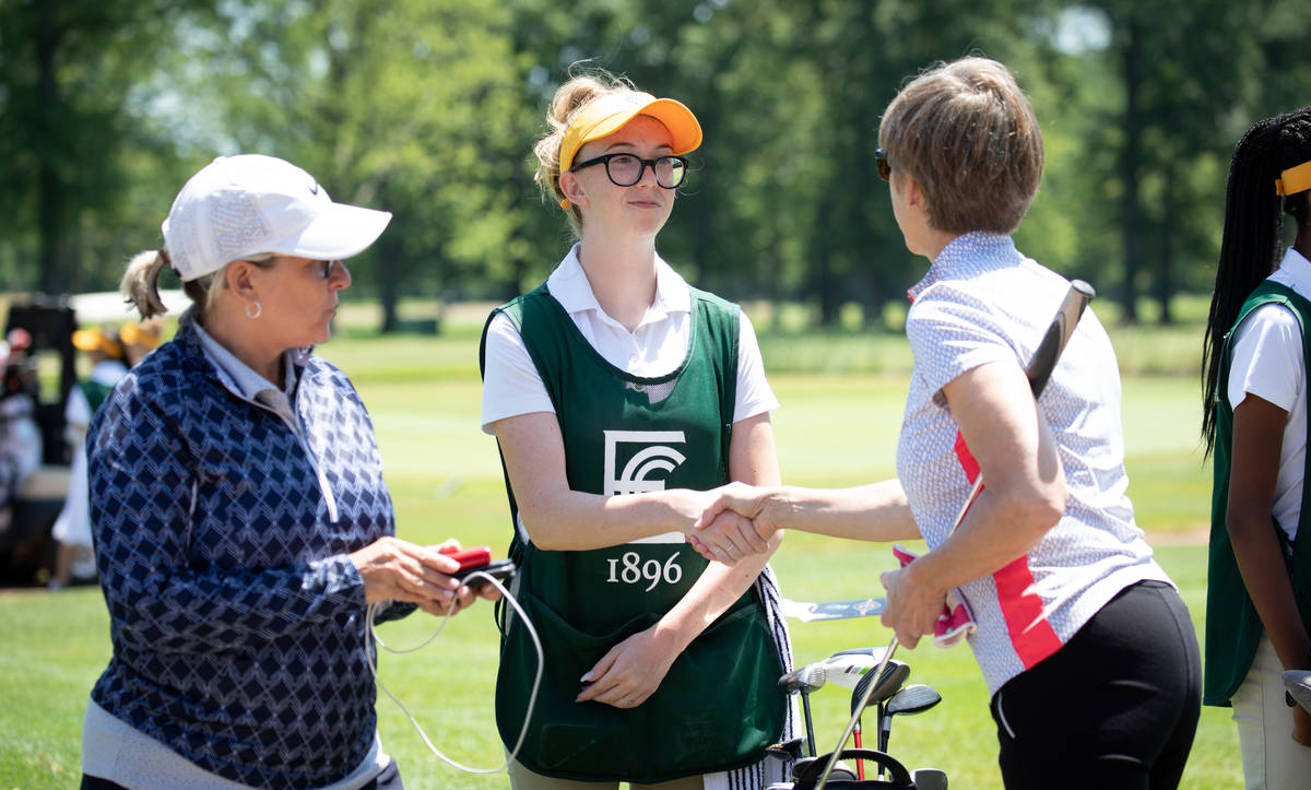 Reality Welch caddying Credit: Charles Cherney Photography