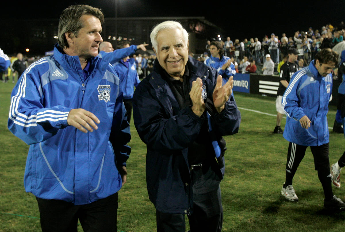 San Jose Earthquakes head coach Frank Yallop, left, and owner Lew Wolff walks on the field afte ...