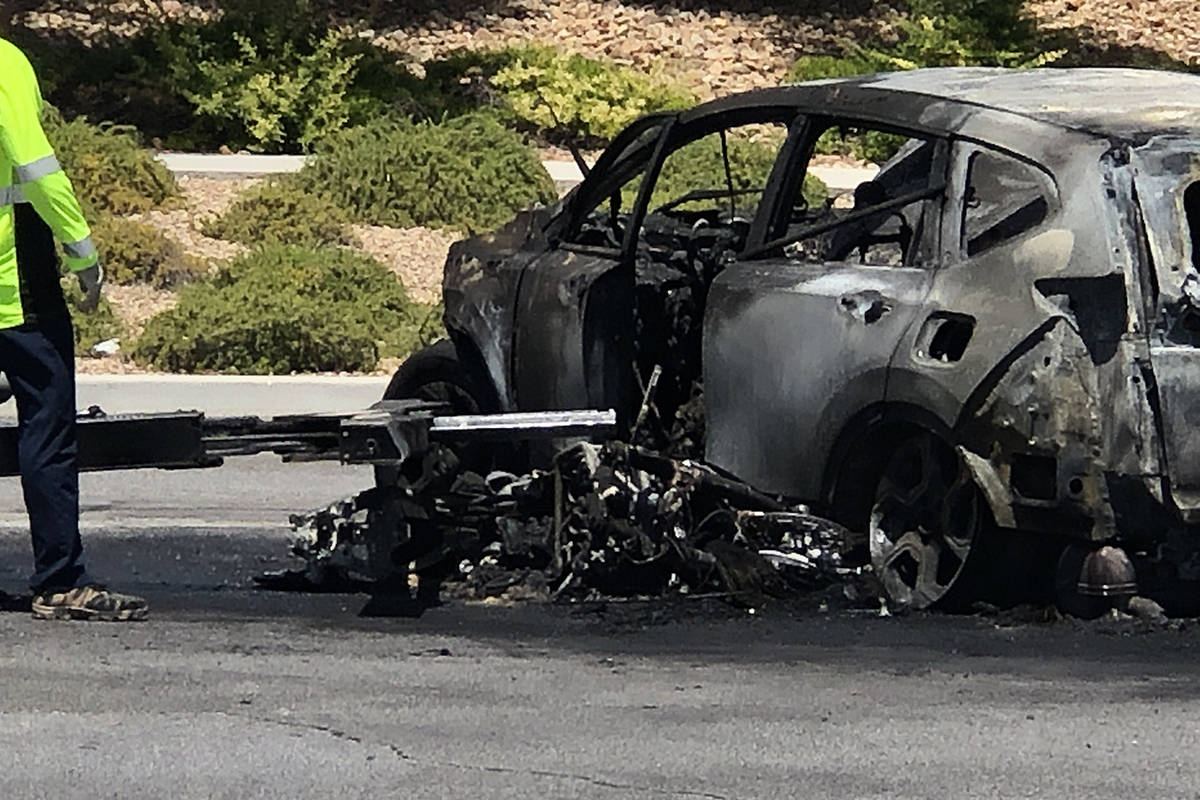 Police investigate a fiery crash involving a motorcycle and SUV on Sunday, June 28, 2020, on De ...