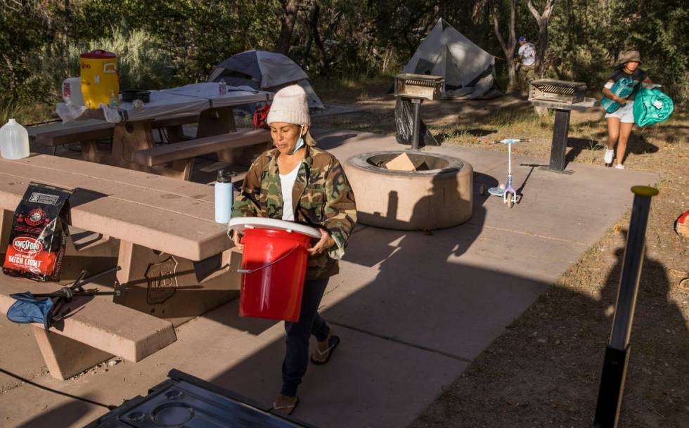 Bridget Nava and her family pack up their camping gear just to be safe as they leave the Fletch ...