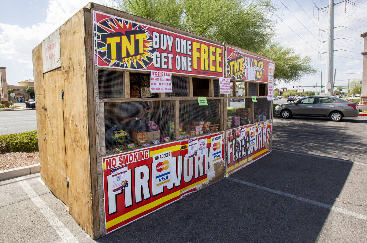 Floyd Ellis looks out of the fireworks booth for Freedom House Sober Living in the Albertsons p ...