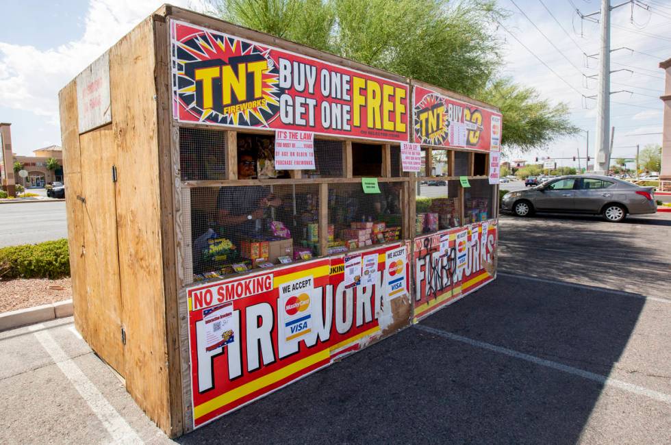 Floyd Ellis looks out of the fireworks booth for Freedom House Sober Living in the Albertsons p ...