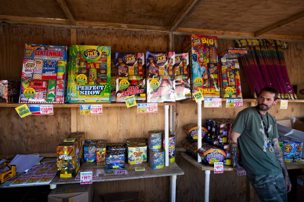 Jeremiah Wicker sits inside the fireworks booth for Freedom House Sober Living in Las Vegas on ...