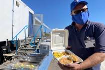 Corey Beasley, the kitchen manager of Cattlemen’s Meat Company of Cut Bank, Montana, shows th ...