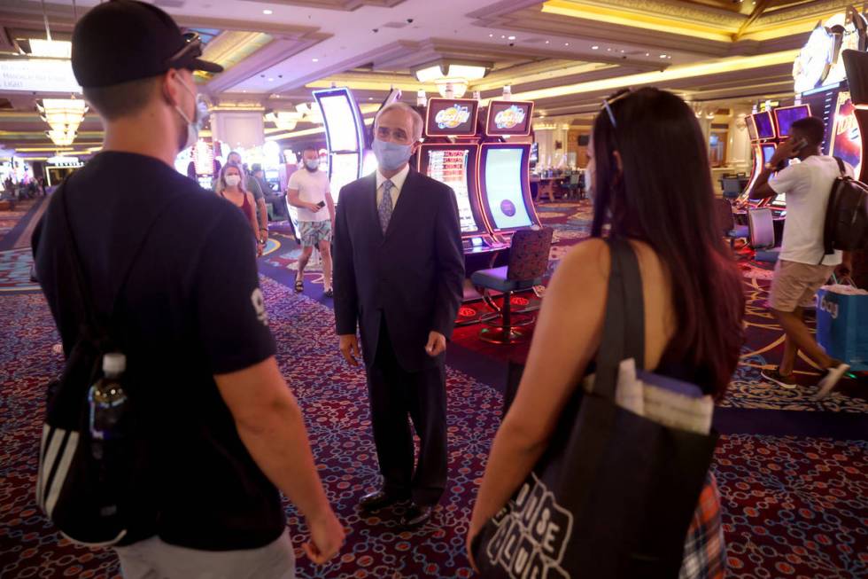 Mandalay Bay President Chuck Bowling talks to newlyweds Jadon and Nicole Brisendine of Sacramen ...