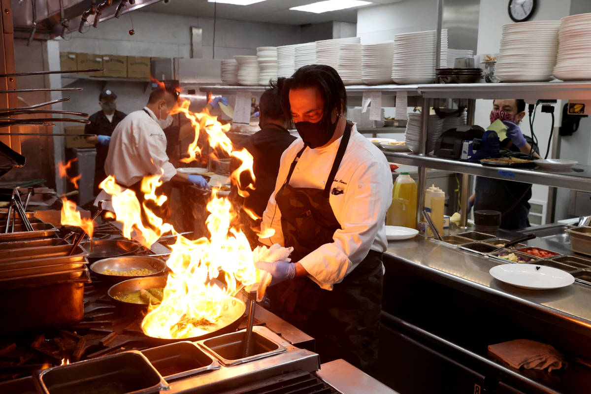 Border Grill Executive Chef Mike Minor makes Chicken Poblano Enchiladas at Mandalay Bay on the ...