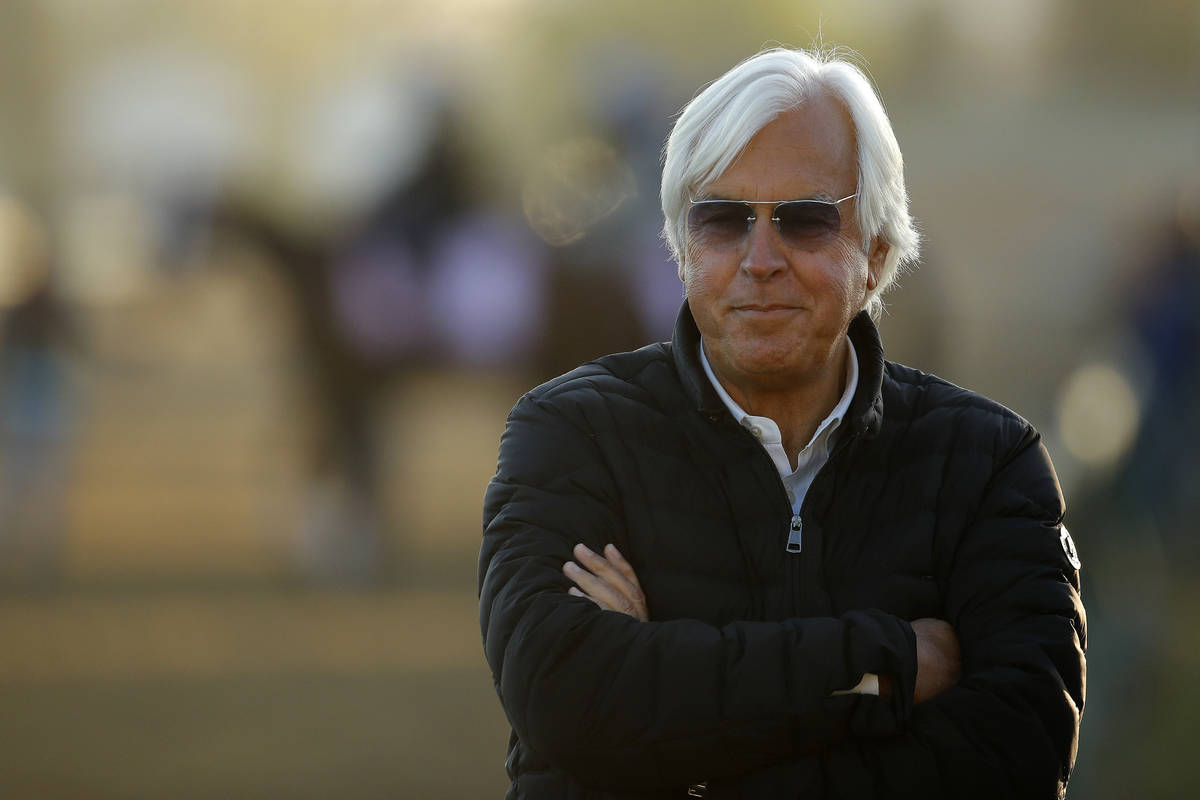 Trainer Bob Baffert watches a morning workout at Churchill Downs Tuesday, May 1, 2018, in Louis ...