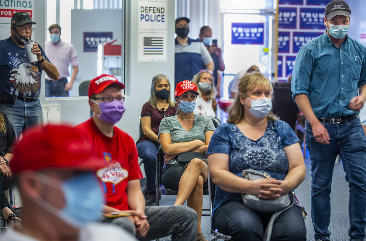 Volunteers receive in-person training at President Donald Trump's re-election campaign headquar ...