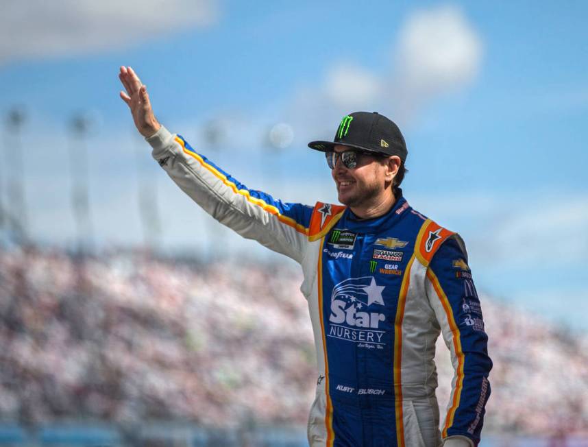 Kurt Busch waves to his fans during his introduction before the start of the Monster Energy NAS ...