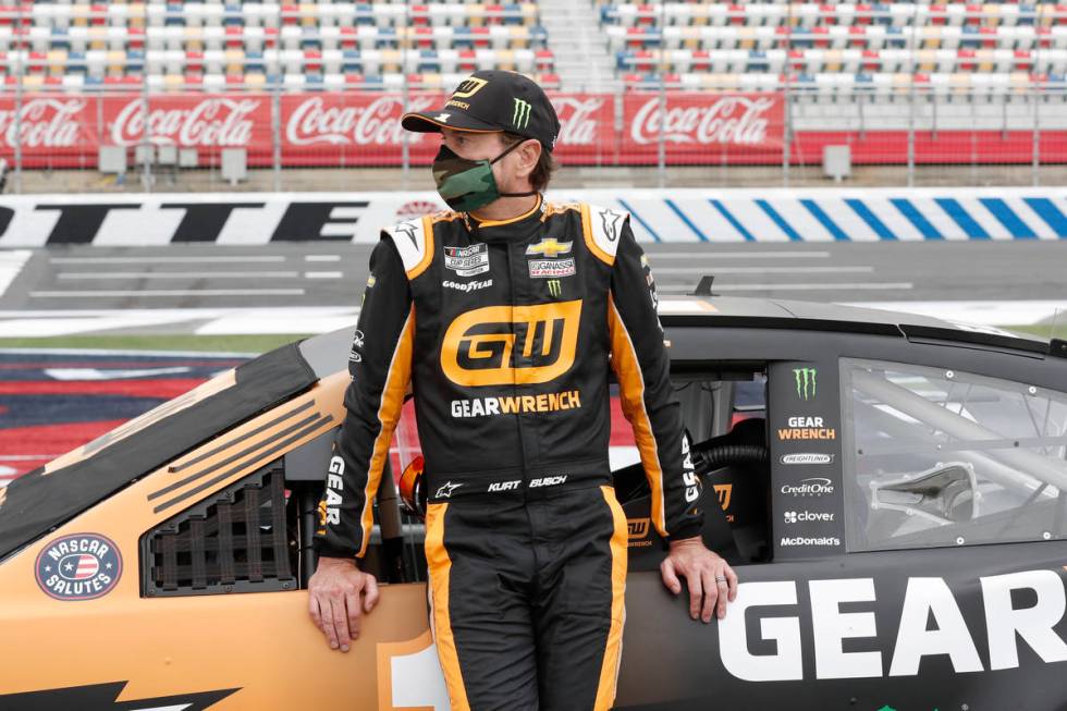 Kurt Busch waits for the start of the NASCAR Cup Series auto race at Charlotte Motor Speedway S ...