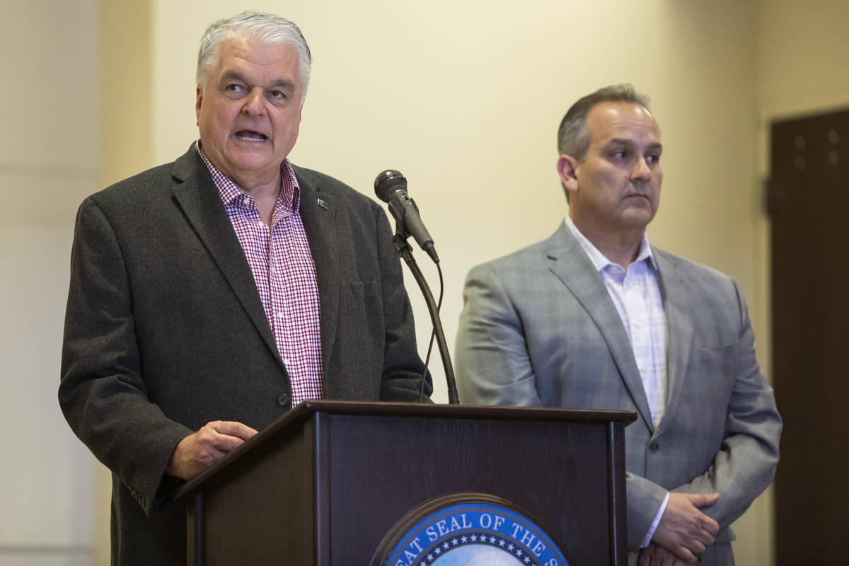 Gov. Steve Sisolak, left, and Clark County School District Superintendent Jesus Jara announce t ...