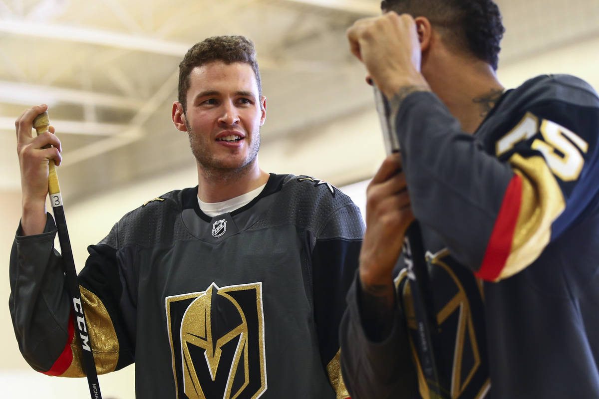 Golden Knights defenseman Brayden McNabb, left, and forward Ryan Reaves participate in a youth ...