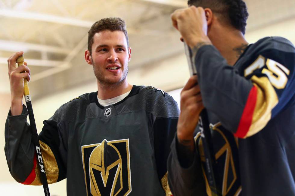 Golden Knights defenseman Brayden McNabb, left, and forward Ryan Reaves participate in a youth ...