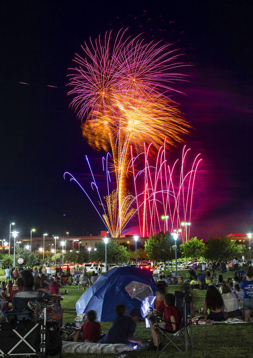 People watch the Red Rock Casino fireworks show from Downtown Summerlin on Saturday, July 4, 2 ...