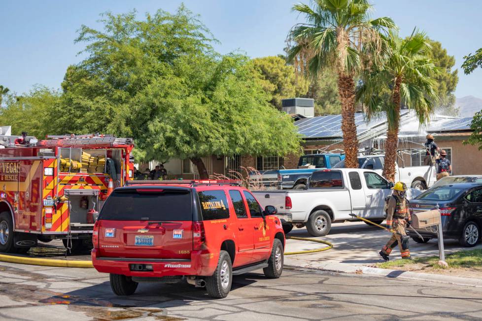 Las Vegas firefighters put out a house fire in the northwest Las Vegas Valley on the 4000 block ...