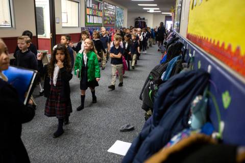 Students at American Preparatory Academy head to their reading groups on Thursday, Feb. 13, 202 ...