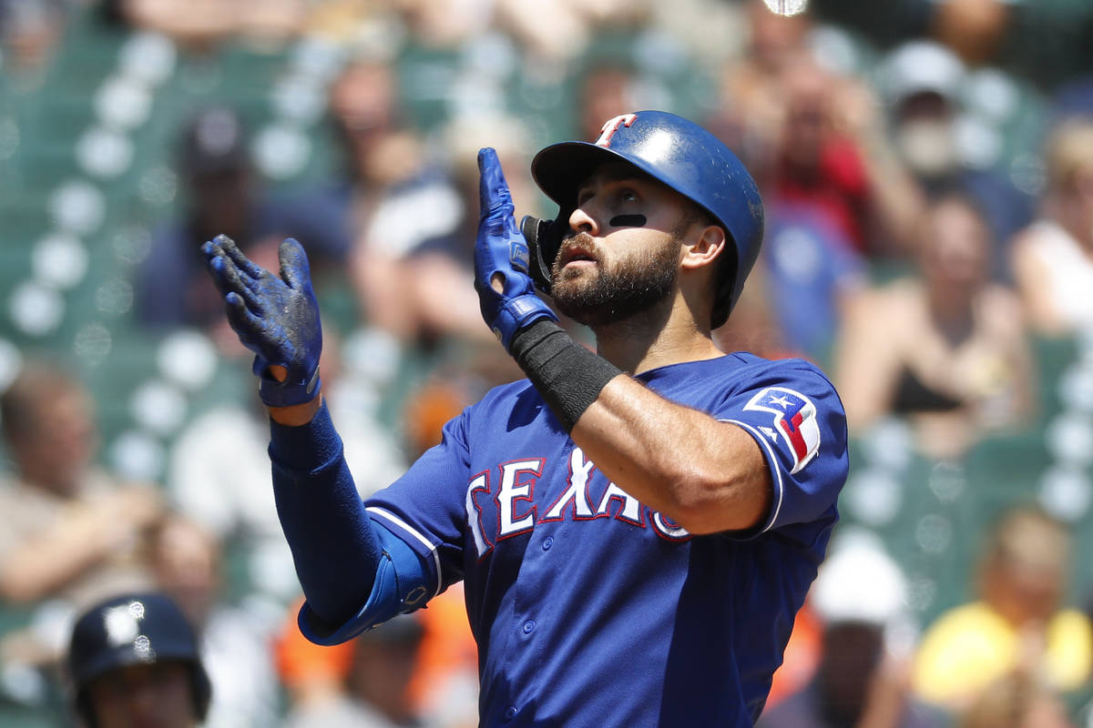 Texas Rangers' Joey Gallo celebrates his solo home run in the fourth inning of a baseball game ...