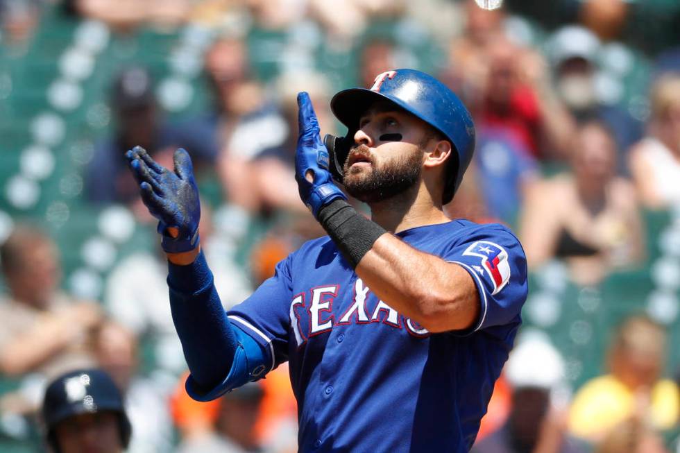 Texas Rangers' Joey Gallo celebrates his solo home run in the fourth inning of a baseball game ...