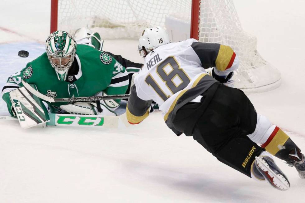 Vegas Golden Knights left wing James Neal (18) scores a goal against Dallas Stars goalie Kari L ...