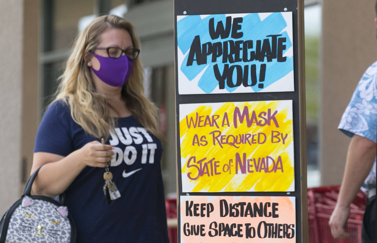 Customers line up to enter Trader Joe's on Friday, June 26, 2020, in Henderson. Starting Friday ...