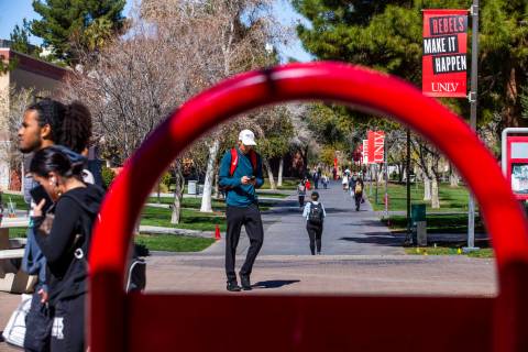 Students walk about the UNLV campus on Tuesday, March 3, 2020 in Las Vegas. (L.E. Baskow/Las V ...