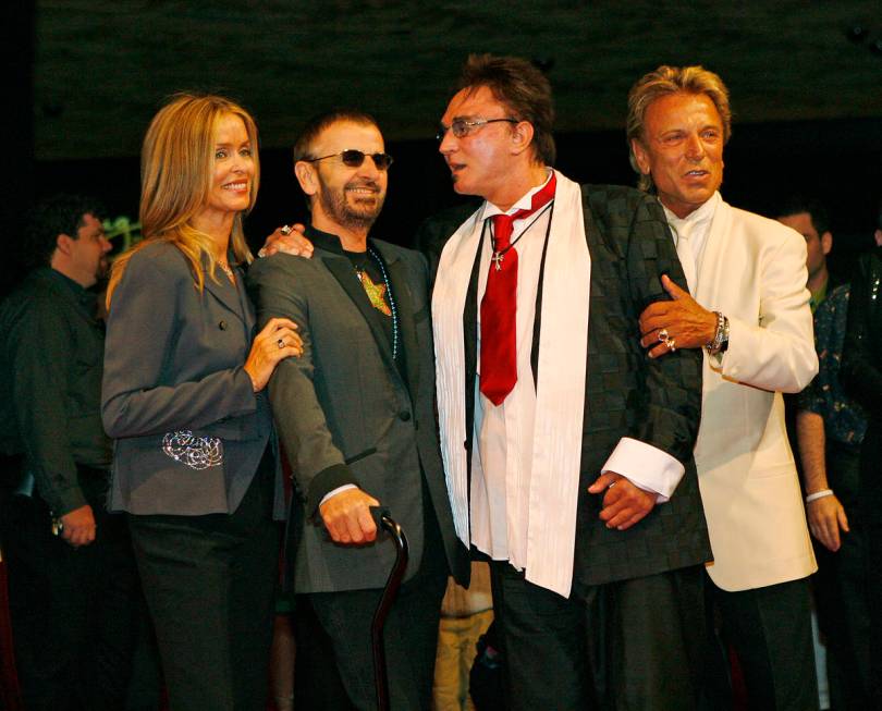 Ringo Starr and his wife Barbara Bach pose for photos with Siegfried and Roy during arrivals at ...