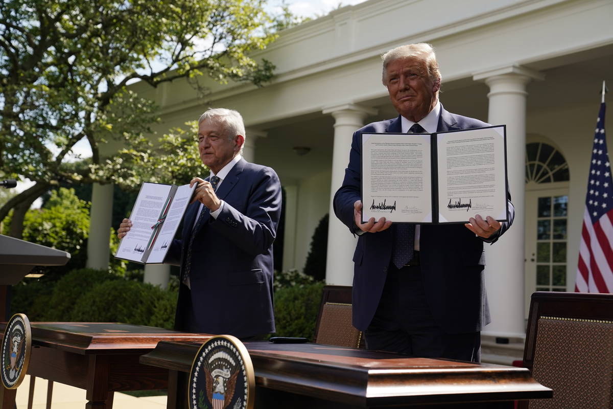 President Donald Trump and Mexican President Andres Manuel Lopez Obrador pose for photos after ...