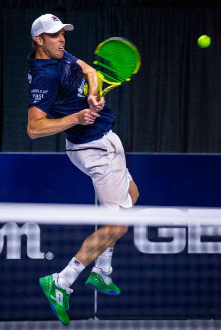 Vegas Rollers' Sam Querrey sends a backhand over the net as he closes the gap in score during h ...